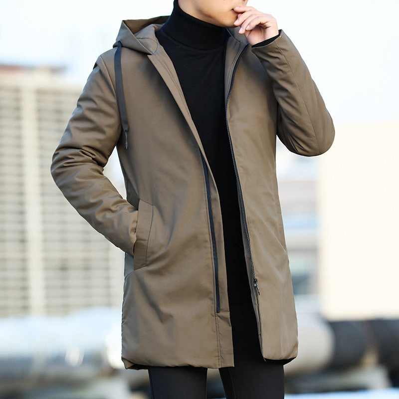 Brown hooded jacket worn by a person with a blurred background