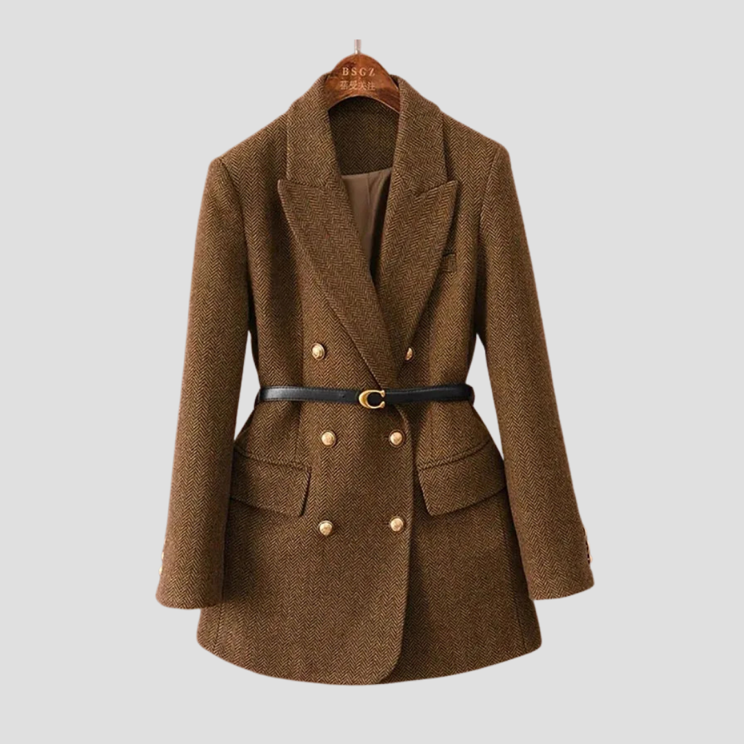 Brown blazer with gold buttons on a hanger against a light gray background