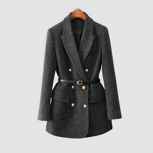 Gray coat with a belt on a hanger against a light gray background
