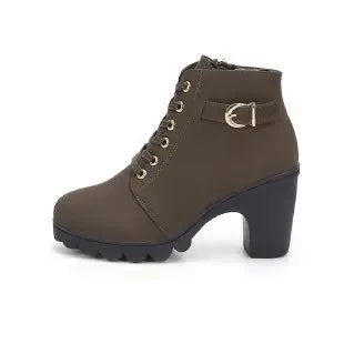 Brown ankle boot with a block heel on a white background
