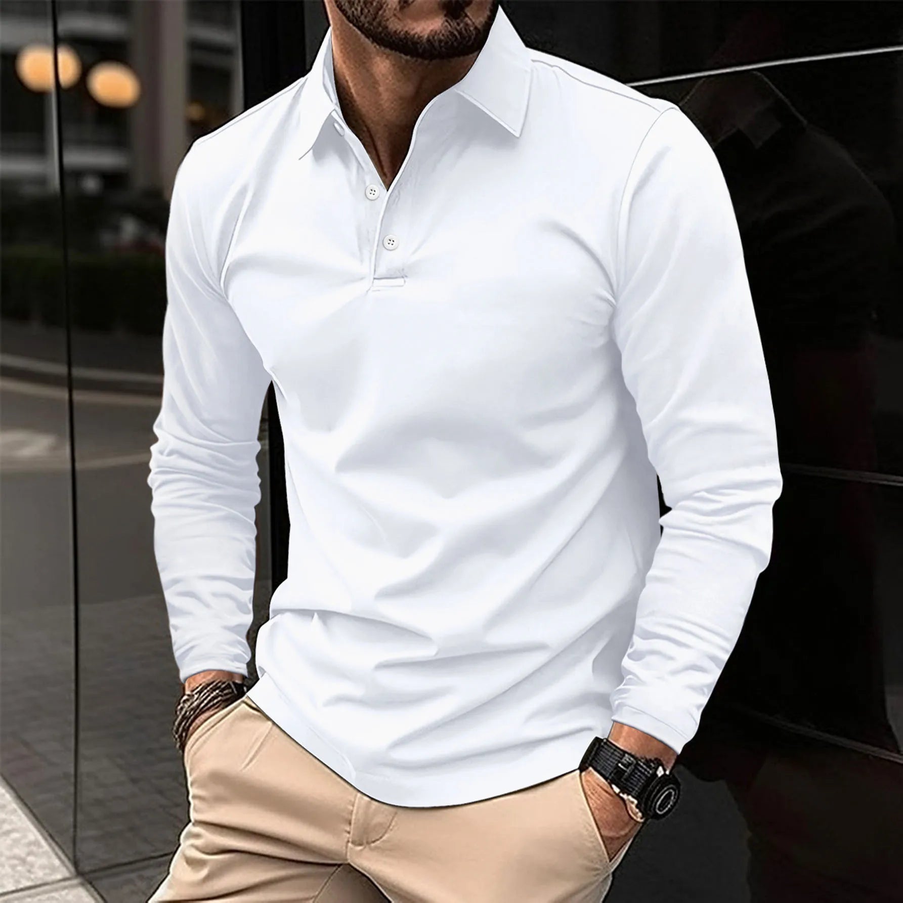 Man wearing a white long-sleeve polo shirt with beige pants.
