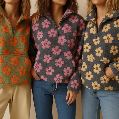 Three people wearing floral patterned jackets against a neutral background